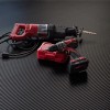 Tools laying on G-Floor Ribbed Tread Vinyl Multipurpose Roll 55 mil x 5x10 Ft. in midnight black