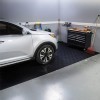  G-Floor Levant Tread Garage Floor Roll 55 Mil x 7.6x17 Ft. SUV parked on Midnight black