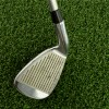 Troon Artificial Turf Roll with 7 iron golf club close up