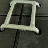 connector connecting four black ground protection mats