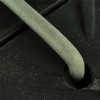 close up of connector connecting two black ground protection mats