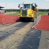 liberty ground protection mats over sports track at stadium