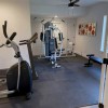home gym flooring tiles pebble under exercise equipment