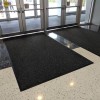 Charcoal mat in doorwar of Chevron Carpet Indoor Entrance Mat 4x6 Ft.