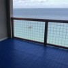 blue interlocking Patio Outdoor Tiles installed on a balcony