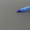Comparing surface texture to pen tip of PaviGym Endurance Fitness Gym Flooring Tile 7 mm