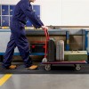person with cart walking on Firmagrip Industrial Matting in industrial facility