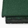 close up of corner of blue sky playground tile in the color green