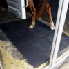 Portable Horse Stall Mats showing horse mat installation trailer