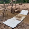 Portable Outdoor Tile being Used on the Beach Path over sand