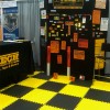 Black and yellow Foam Premium Interlocking Trade Show Mats 10x10 Ft. Kit