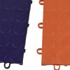 RaceDeck CircleTrac Garage Floor Tiles 1/2 Inch x 1x1 Ft. open interlocks of Royal Purple and Orange tiles