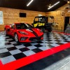 Red Corvette on RaceDeck Diamond Garage Floor Tile 1/2 Inch x 1x1 Ft. in Alloy, Black and Red