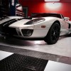 RaceDeck Diamond TuffShield Garage Floor Tile 1/2 Inch x 1x1 Ft. Ford GT on alloy, black, graphite and white tiles