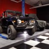 RaceDeck Diamond TuffShield Garage Floor Tile 1/2 Inch x 1x1 Ft. bronco on alloy, black and white tiles