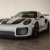 RaceDeck Garage Floor Border Edges Corners 1/2 Inch x 2x18 Inches car parked on smoked oak tiles