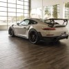 RaceDeck Oak Garage Floor Tiles 1/2 Inch x 18x18 Inches in garage with porsche