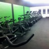 Rubber Flooring Rolls 8 mm 25 Ft Black Stocked showing workout room.