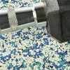 close up of nuclear rubber flooring tiles ocean view color with dumbbell on top