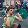 Man Doing Front Squats on Rolled Rubber Gym Flooring