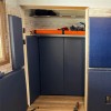 2x5 foot blue safety wall pads installed in closet in disability home