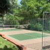 DunkStar Pickleball Outdoor Court Tile with Lines 30x60 Ft. beige and green court with net