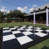 SnapLock Dance Floor Plus Standard Tiles 1/2 Inch x 3x3 Ft. outdoor farm event in Slate White and Black