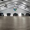 Large tent install of SnapLock Dance Floor Plus Premium Tiles 1/2 Inch x 3x3 Ft. in Smoked Oak