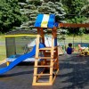 flexible outdoor tiles over uneven ground under swingset