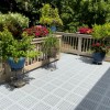 light gray perforated outdoor tiles on existing deck thumbnail