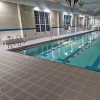 light gray staylock waterproof deck tiles used as indoor pool flooring