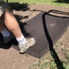 commercial brown playground rubber swing mats underneath swing on dirt