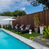 Simply Natural Artificial Grass Turf 1-1/2 Inch x 15 Ft. Wide Per SF pool side