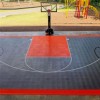 VersaCourt Boost Outdoor Court Tile 1/2 Inch x 1x1 Ft. half court in bright red and graphite