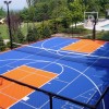 VersaCourt Boost Outdoor Court Tile 1/2 Inch x 1x1 Ft. royal blue and orange multi-sport court