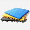Stack of VersaCourt Compete Indoor Court Tile 1/2 Inch x 10x10 Inches in royal blue, yellow and black