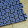 VersaCourt Pickleball Performance Court Tile 3/4 Inch x 10.13x10.13 Inches in navy blue over concrete