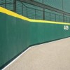 Outdoor Field Wall Padding for Chain Link Fences with Graphics 6x4 ft green pad.