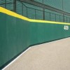 Outdoor Field Wall Padding with Z Clip and Graphics 2 ft x 4 ft green pad.