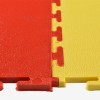 Smooth Top PVC Interlocking Color Ever Tile Red - Yellow Interlock Close Up