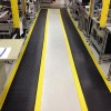 Wearwell Diamond-Plate SpongeCote 2x75 Ft. Black w/Yellow Borders runners in work area
