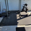 home gym flooring tiles pebble top under weightlifting equipment