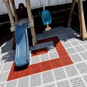 kids swingset play area using staylock outdoor patio tiles
