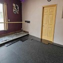 subfloor tile installation in dance studio