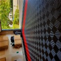 black and red perforated garage tiles