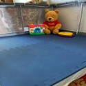 blue kids foam mats in playpen