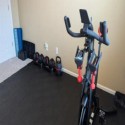 home gym with black staylock tiles