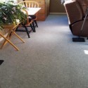 royal interlocking carpet in living room seating area