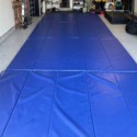 blue folding gym mats in garage