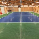 blue and green pickleball court tiles indoor